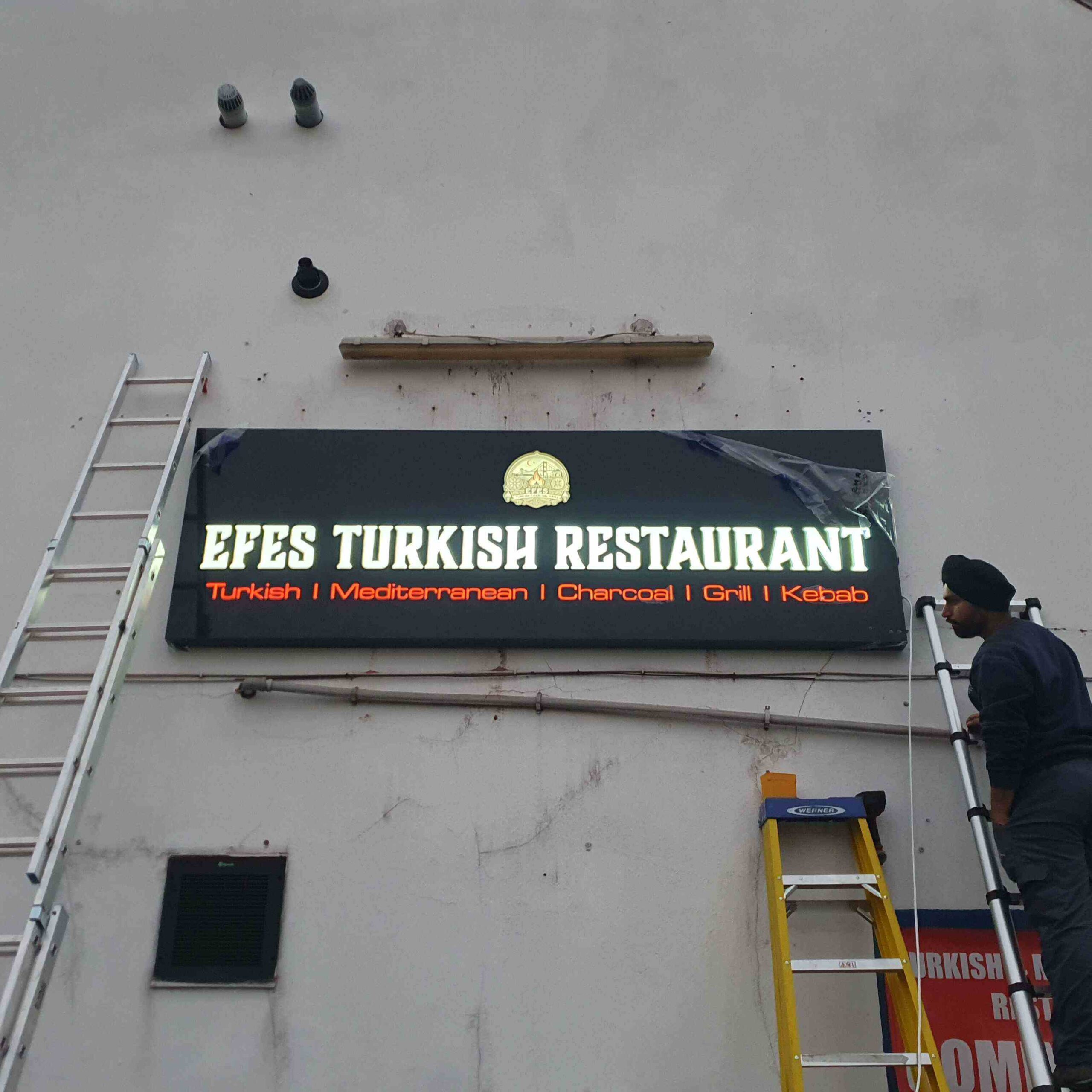 Professional sign maker in Birmingham creating bespoke business signs
